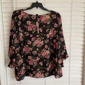 Floral, light weight satiny blouse.